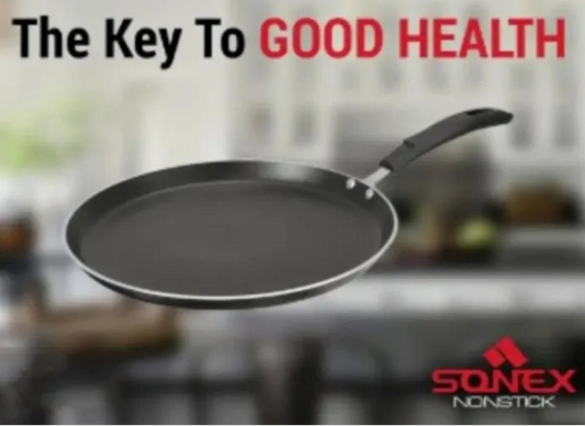 Black nonstick frying pan with 'Sonex' branding against a blurred kitchen background.