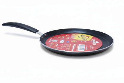 Black frying pan with a red label on a white background