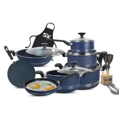 Set of blue cookware with lids and a black apron on a white background