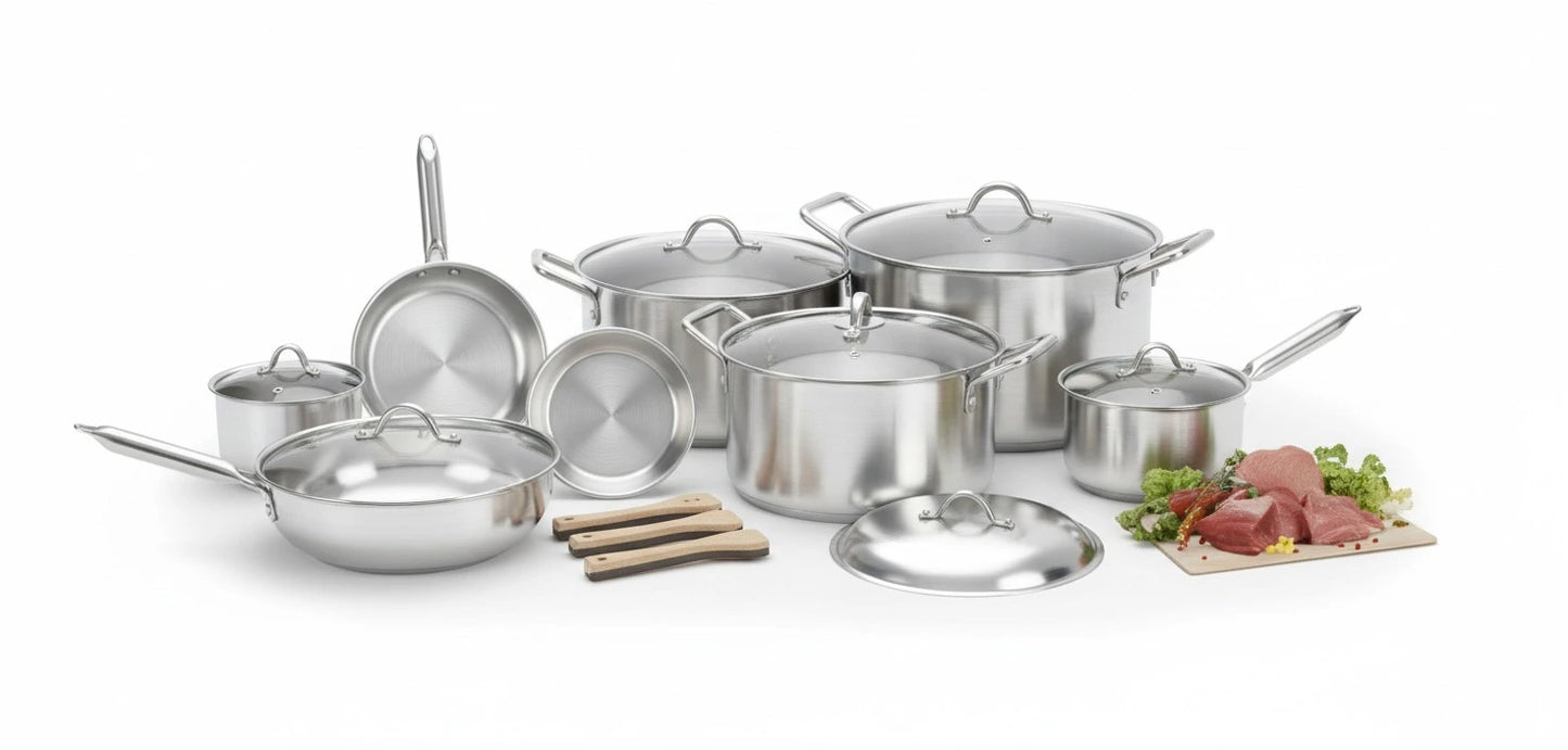 Set of stainless steel cookware on a white background with some food items.