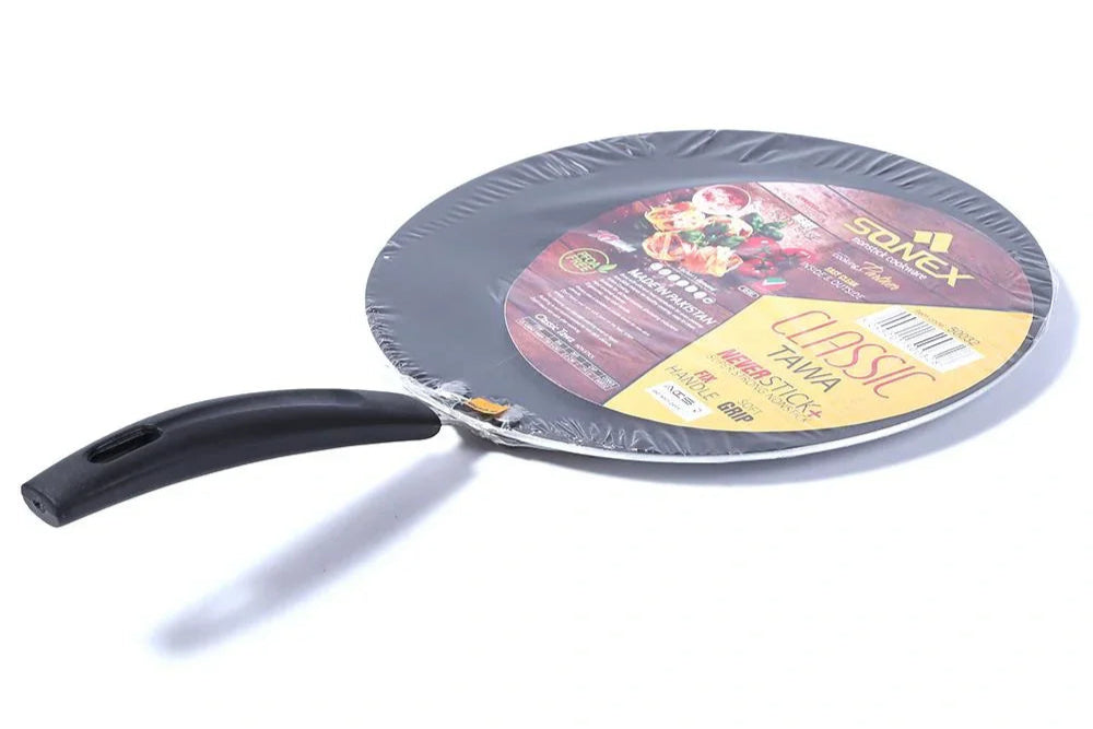 Tawa pan with a visible brand label on a white background